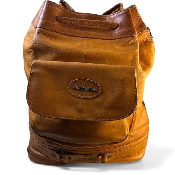 Kalahari Handbags - Kalahari Leather Bucket Backpack Brown Drawstring Flap Pocket Adjustable Straps